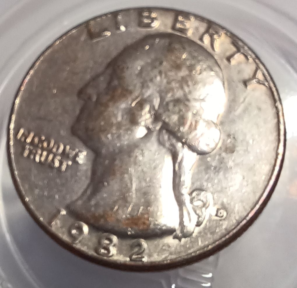 1982-Quarter-With-Copper-Showing-Through-Face.-Cladding-Error?